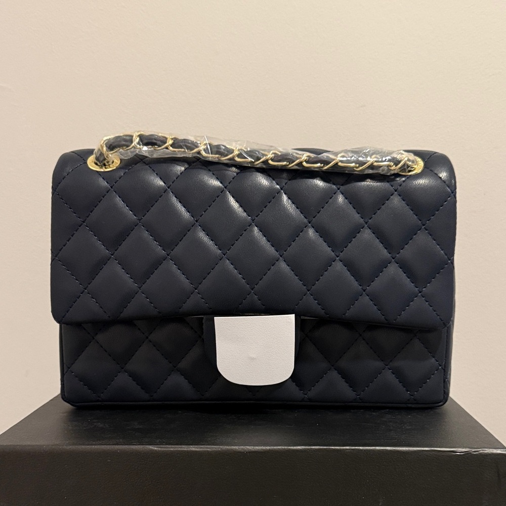 Navy blue quilted leather shoulder bag